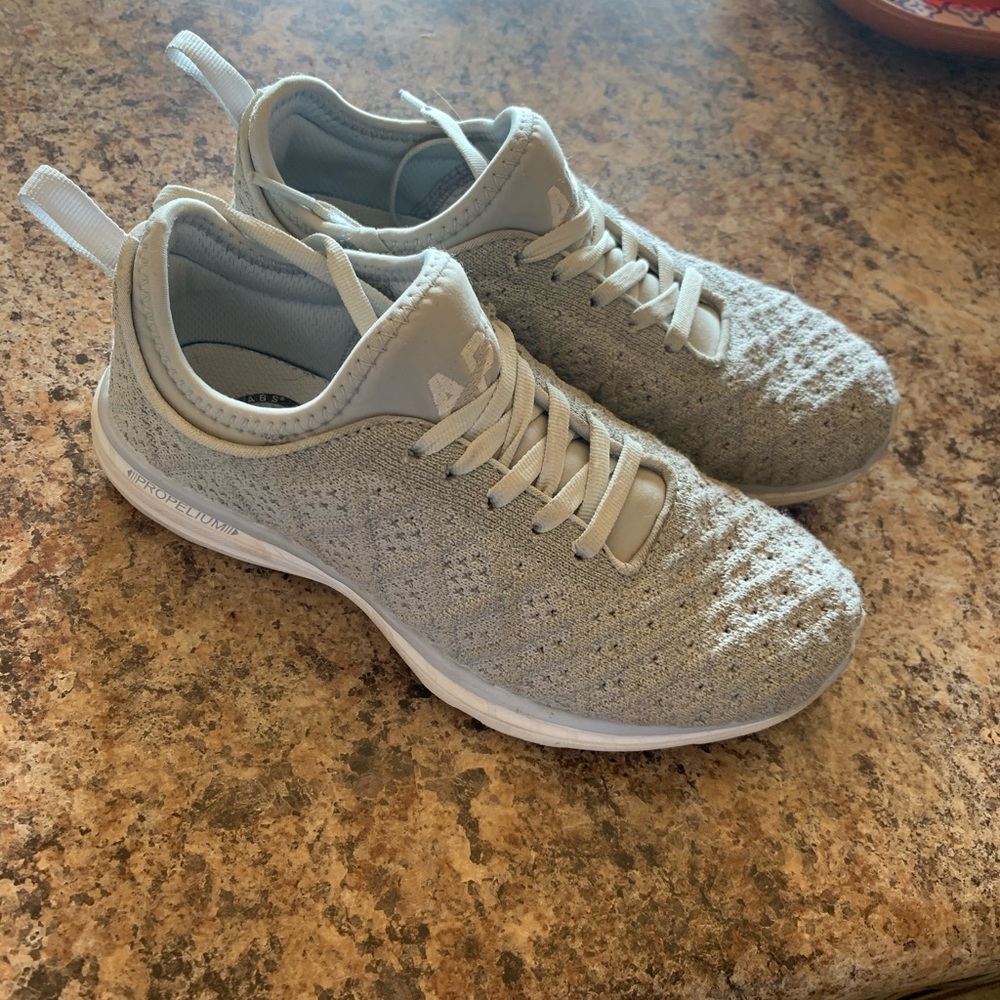 Silver APL tennis shoes! Excellent used condition!